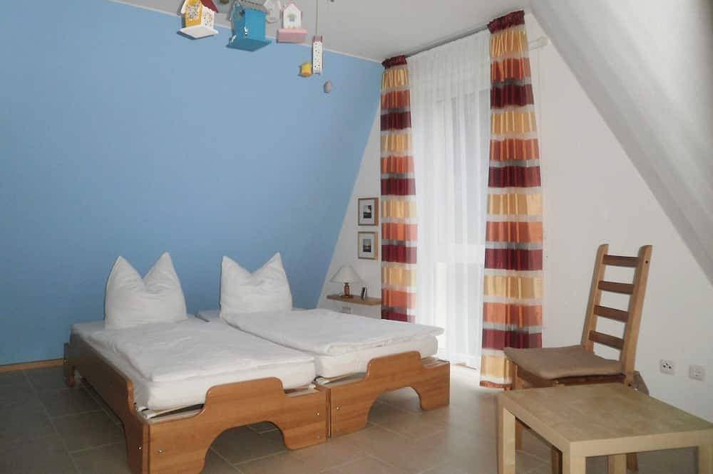 Foto 2 von 17: Ferienwohnung Dachgeschoss - Ferienwohnhaus Drei am Zemminsee