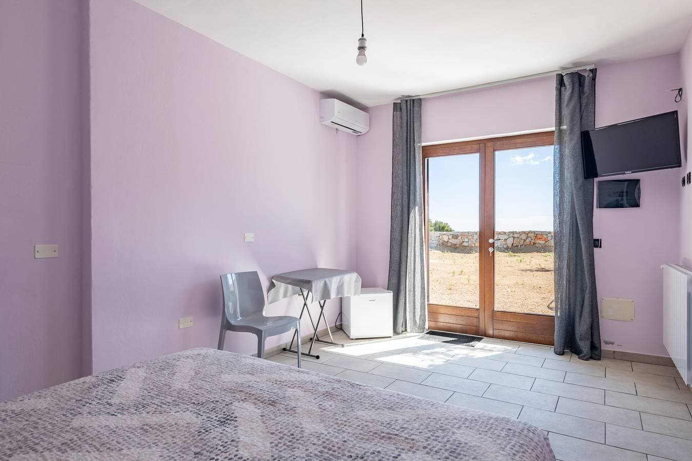 Foto 11 von 23: Ferienhaus 'Ami' mit Meerblick, privater Terrasse und Gemeinschaftsgarten