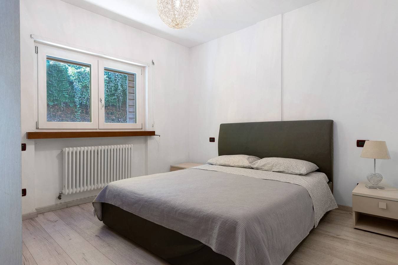 Foto 8 von 27: Apartment 'Valsugana D’incanto' mit Seeblick, privater Terrasse und Gemeinschaftsgarten