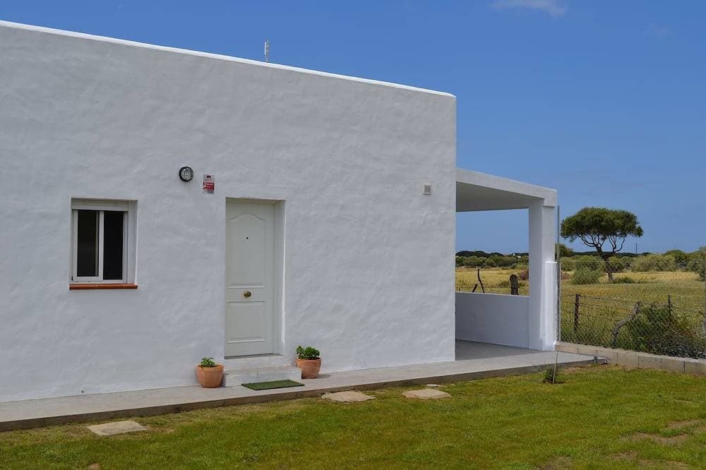 Foto 6 von 30: Villa in Los Caños de Meca von 1000m2 Grundstück neben dem Feld und dem Strand.