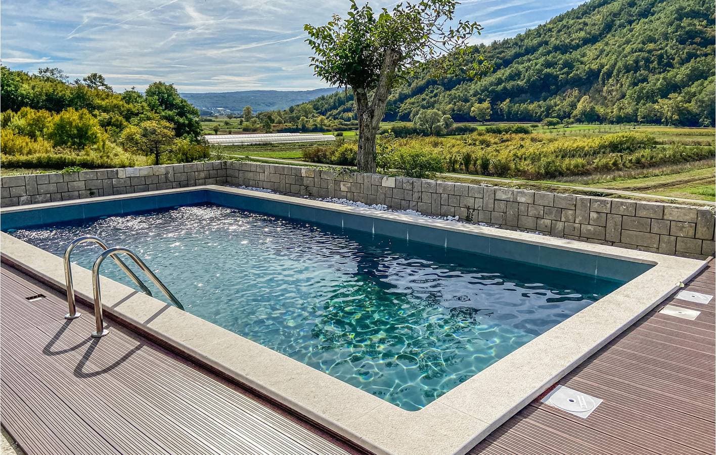 Foto 2 von 37: Charmante 74 m² große Wohnung mit Terrasse, Pool und WLAN für Ihren perfekten Urlaub