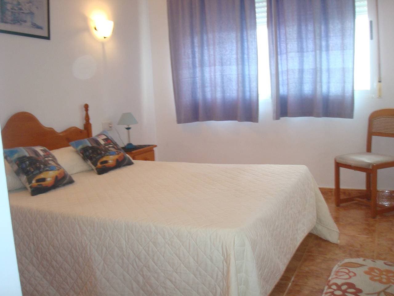 Foto 9 von 28: Wohnung im Erdgeschoss, mit großer Terrasse, zwei Schlafzimmer, Klimaanlage und