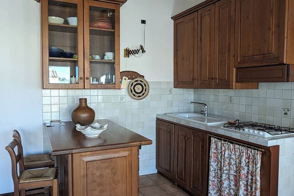 Foto 10 von 13: Casa Singola Immersa nel Verde con Vista Mare
