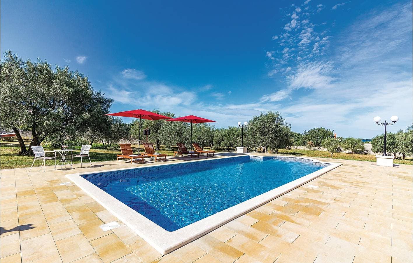 Foto 10 von 37: Reizende Ferienwohnung mit Terrasse und Pool, 1,5 km vom Strand von Fažana entfernt