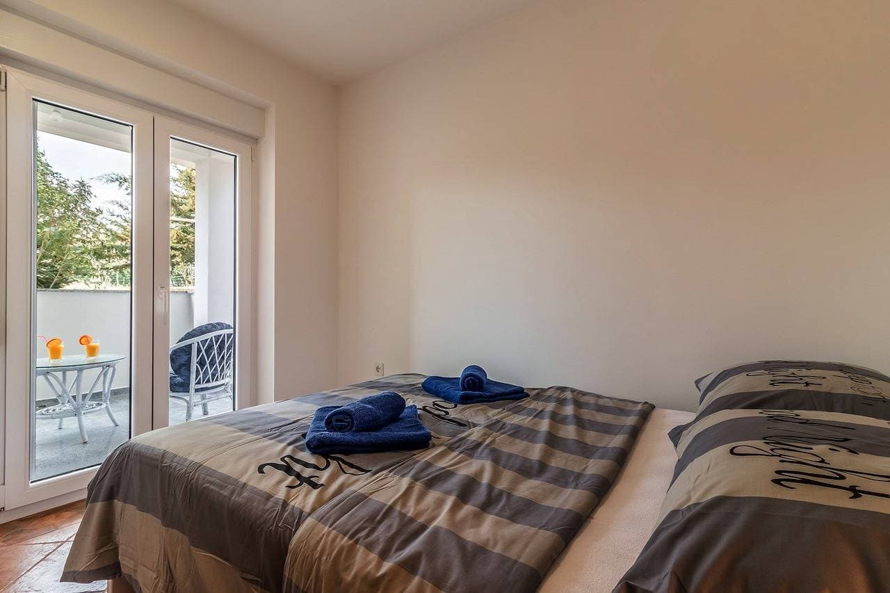 Foto 5 von 14: Comfortable lovely apartment with patio and grill / A2