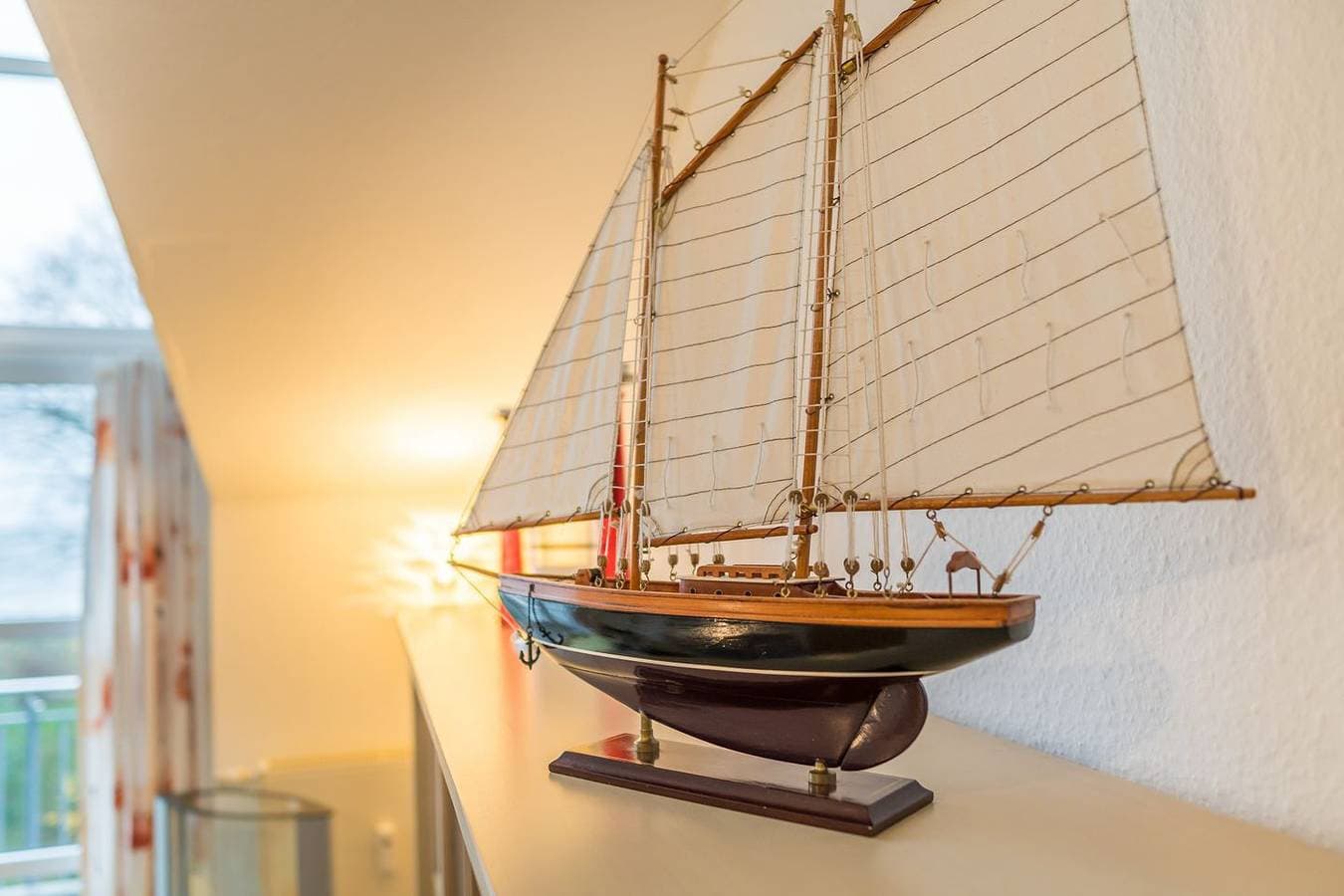 Foto 12 von 12: Elegante Ferienwohnung mit Meerblick und Galerie, direkte Strandlage