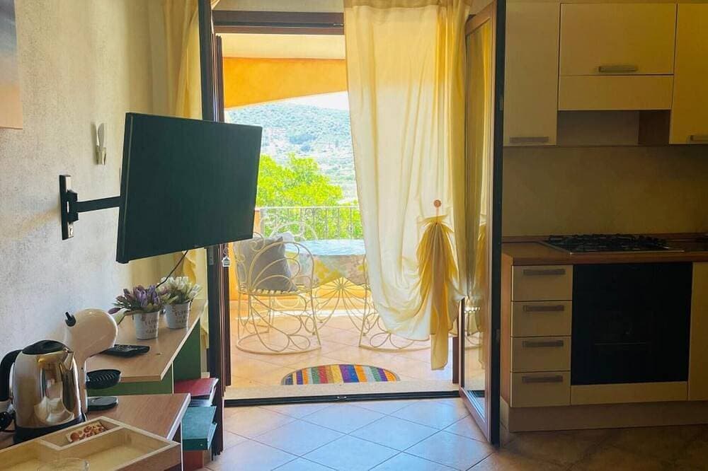 Foto 4 von 22: New Orange Studio – Modernes Apartment für 2 Gäste in Budoni, nahe Stränden & Pool