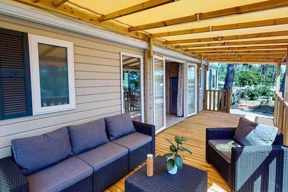Foto 8 von 22: ZEcamping 3 étoiles parc aquatique animaux acceptés mobil-home clim 36m2
