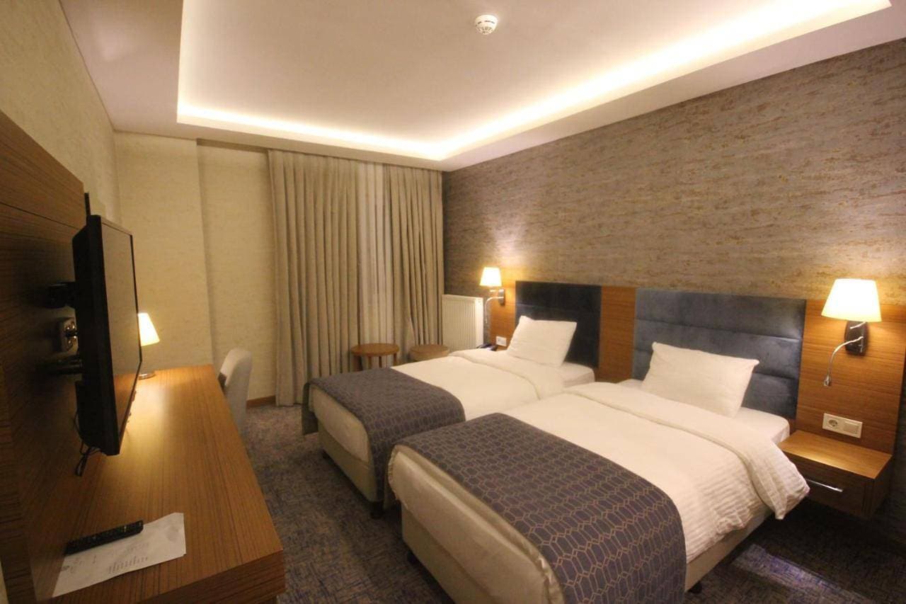 Foto 8 von 9: Deluxe Double Room with Two Double Beds