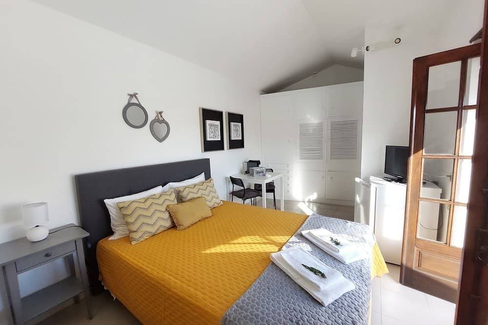 Foto 3 von 30: Apartamento Delfino T0 2 Camas