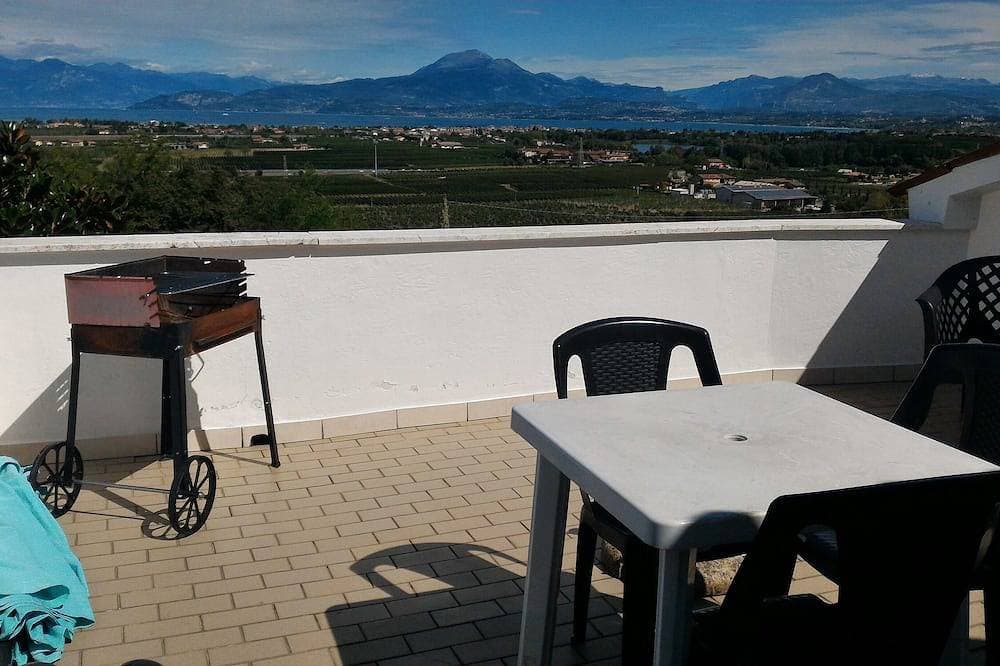 Gardasee: Penthouse Garten mit Blick auf den See in Peschiera Graditi Tiere 1
