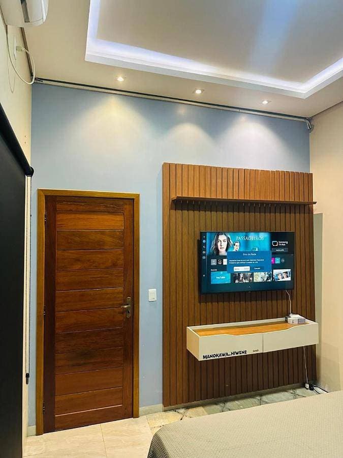 Foto 4 von 9: Family Room with Shared Bathroom