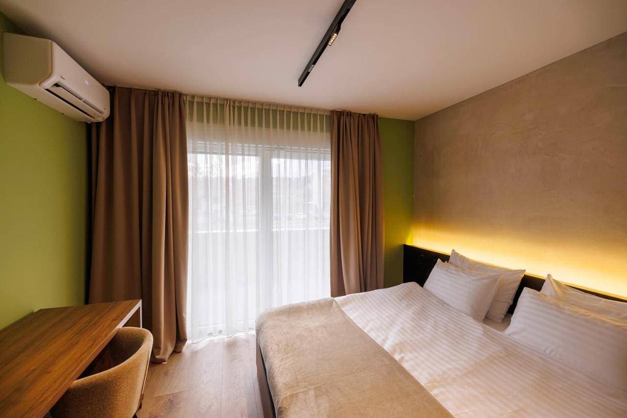 Foto 11 von 11: Double Room with Balcony (2 Adults + 1 Child)