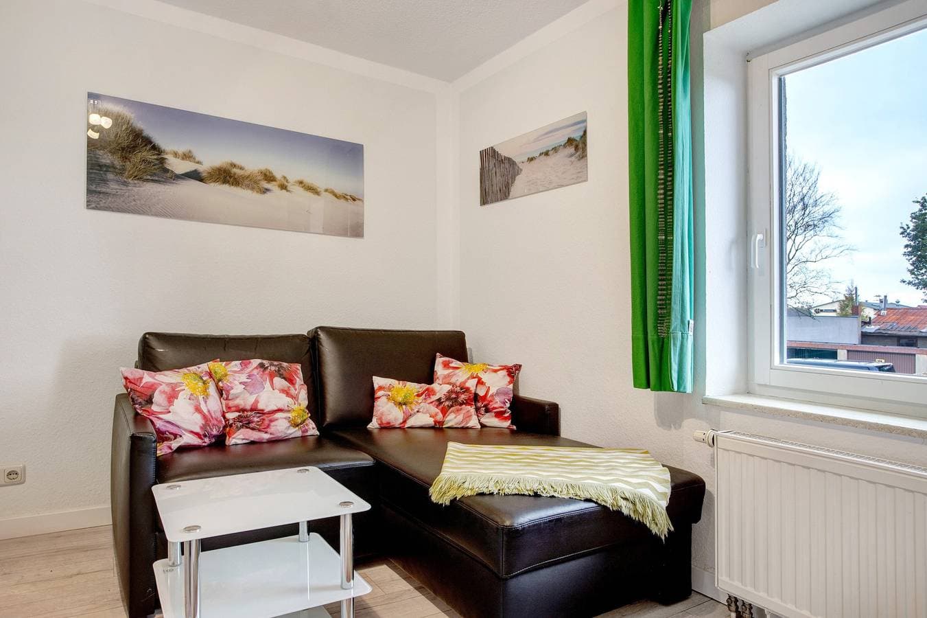 Foto 2 von 25: Ferienwohnung 'Bäckerhus - Ferienwohnung 6' mit Privatterrasse, Gemeinschaftsgarten und Wi-Fi