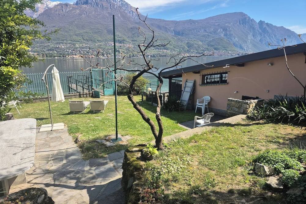 Foto 4 von 25: Ferienhaus am See mit privatem Garten und Seebrücke.