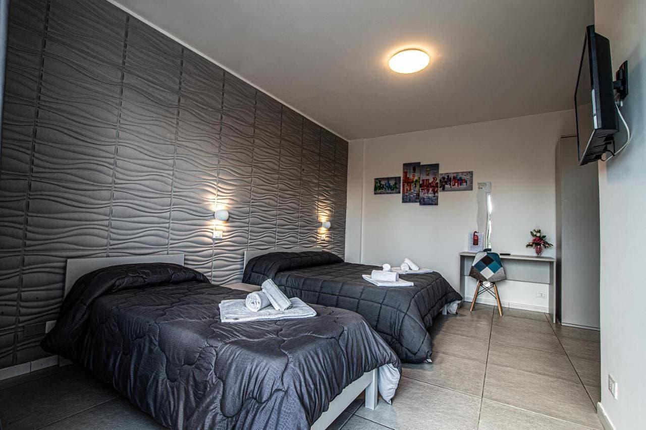 Foto 10 von 17: Triple Room with Garden View