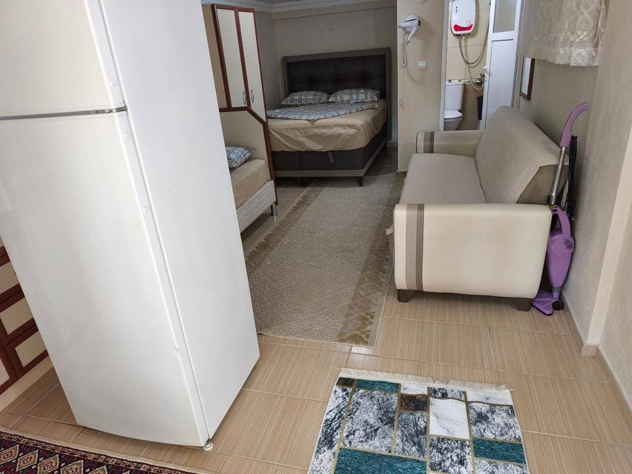 Foto 11 von 26: Quadruple Room with Garden View