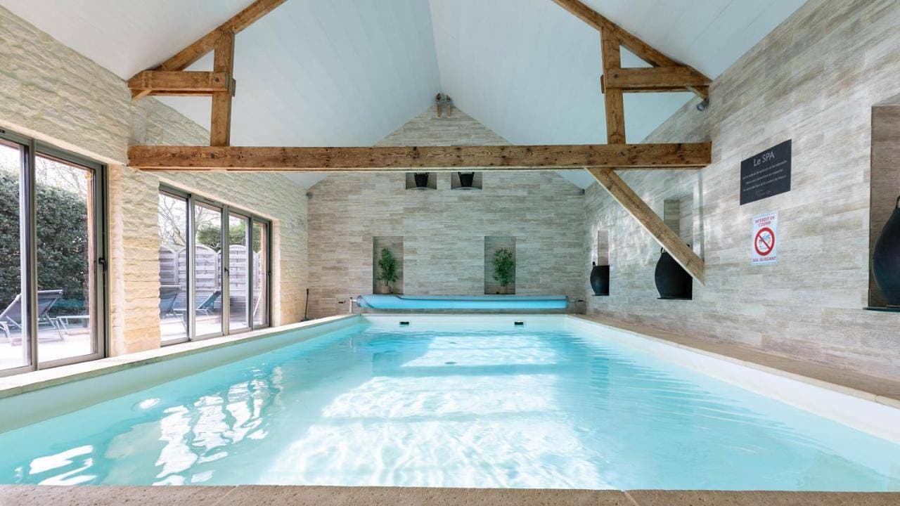 Foto 4 von 54: Three-Bedroom Holiday Home with Access to Pool and Spa to