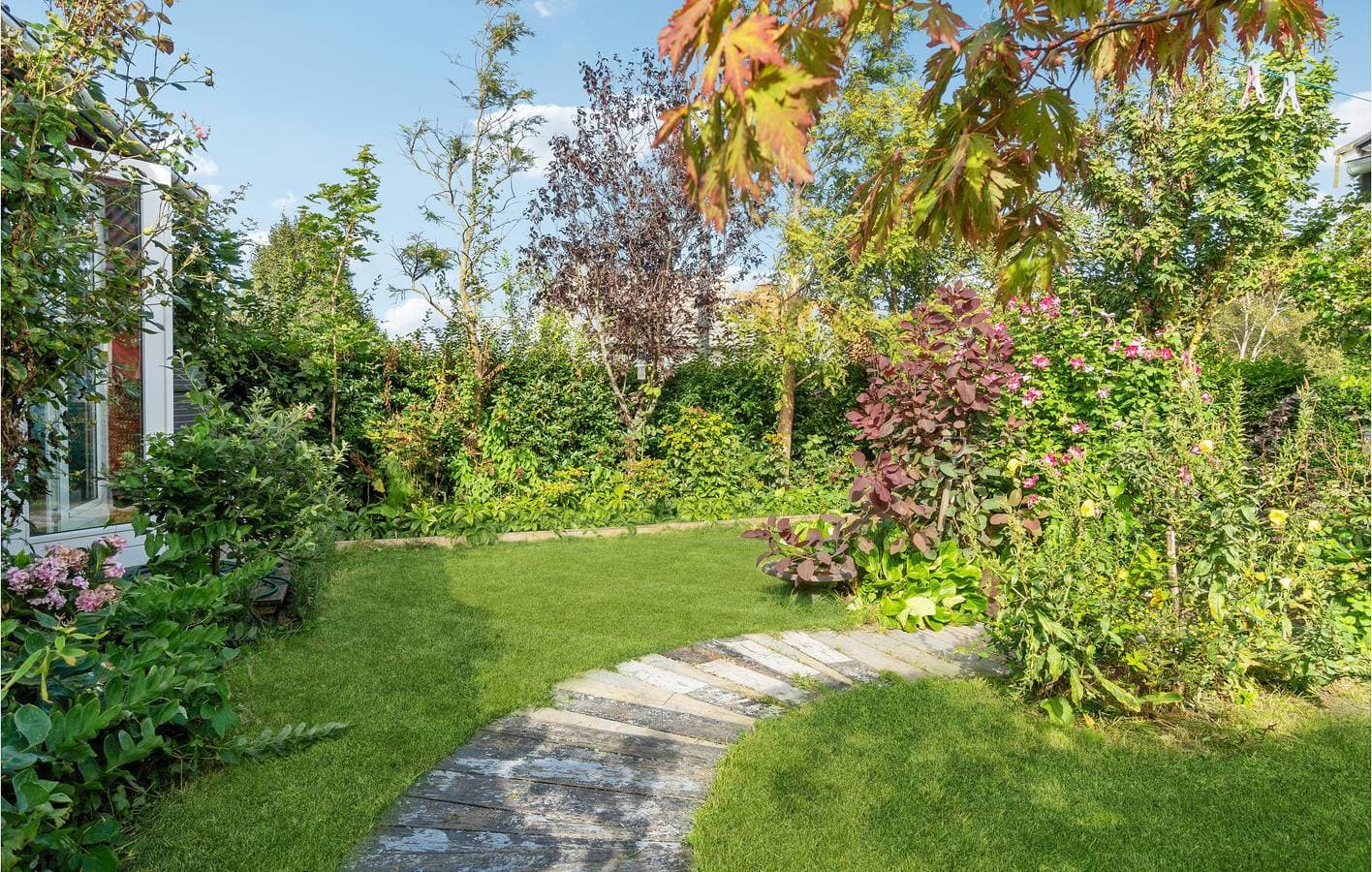 Foto 3 von 22: Ferienwohnung für 4 Personen mit Garten
