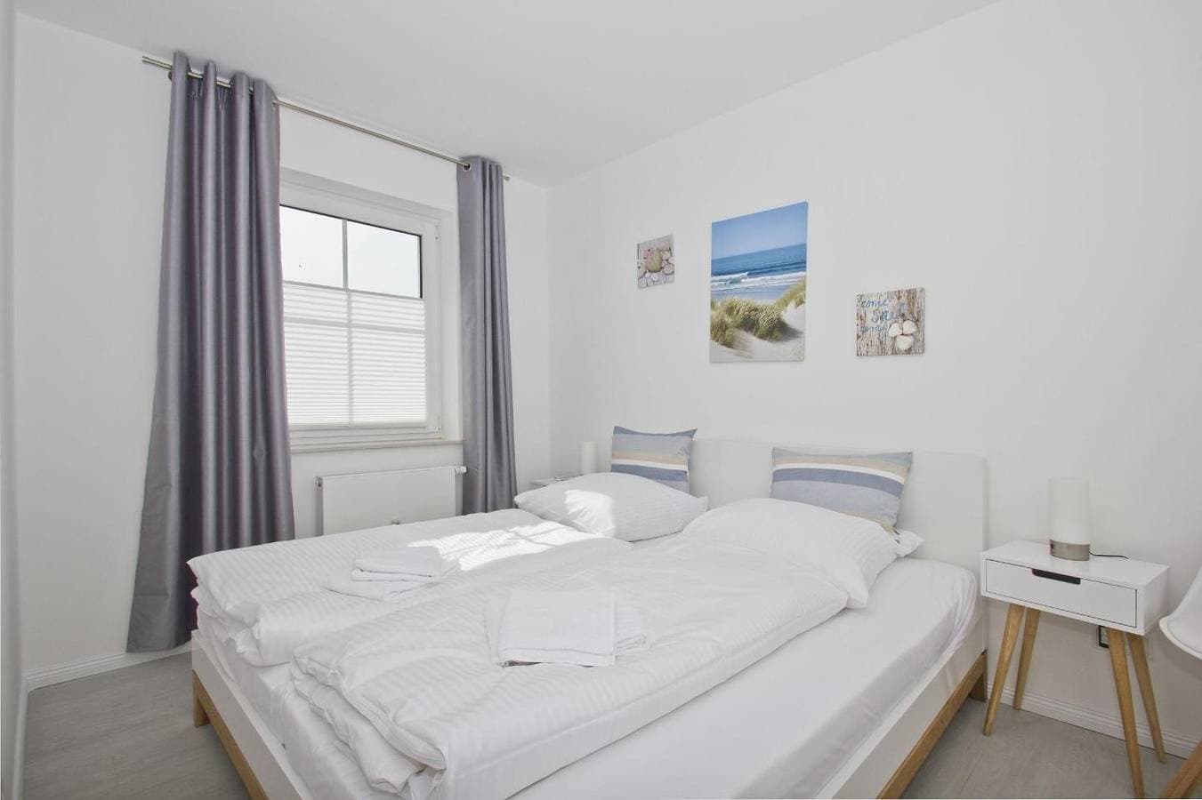 Foto 11 von 18: Modernen Ferienwohnung mit eigener Terrasse - Haus Inselwind FeWo MEERküste