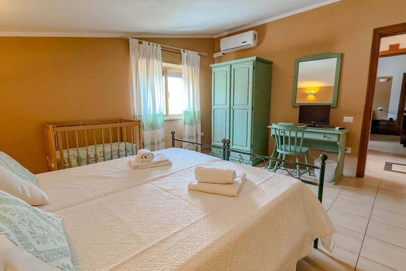 Foto 3 von 13: Su Recreu 'E Mare 304 - Dreibettzimmer