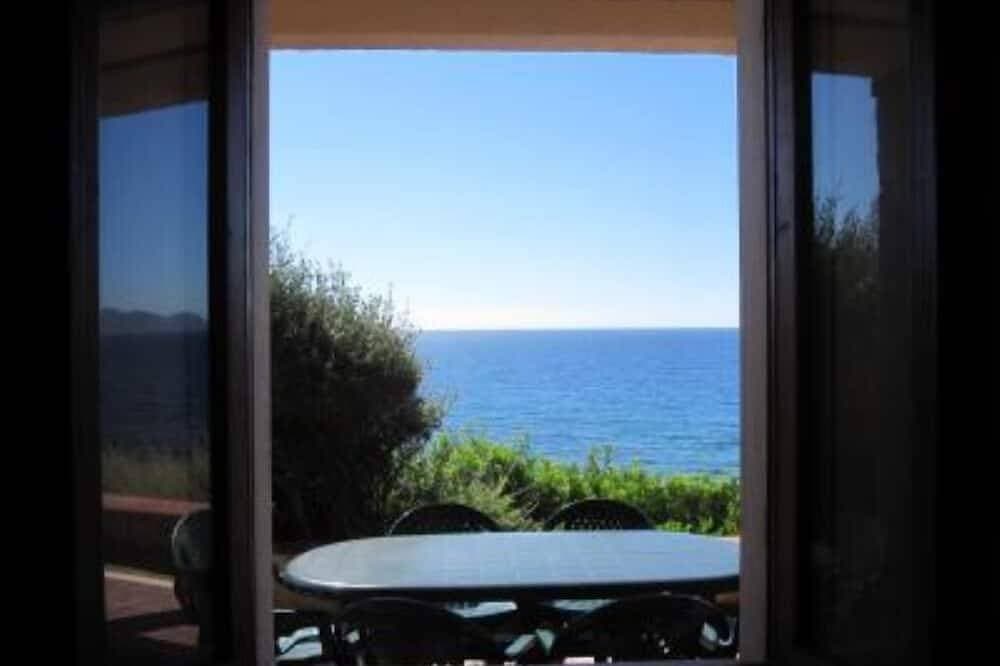 Foto 13 von 14: Freistehendes Ferienhaus mit Panoramablick über das Meer  und direktem Zugang zum Strand