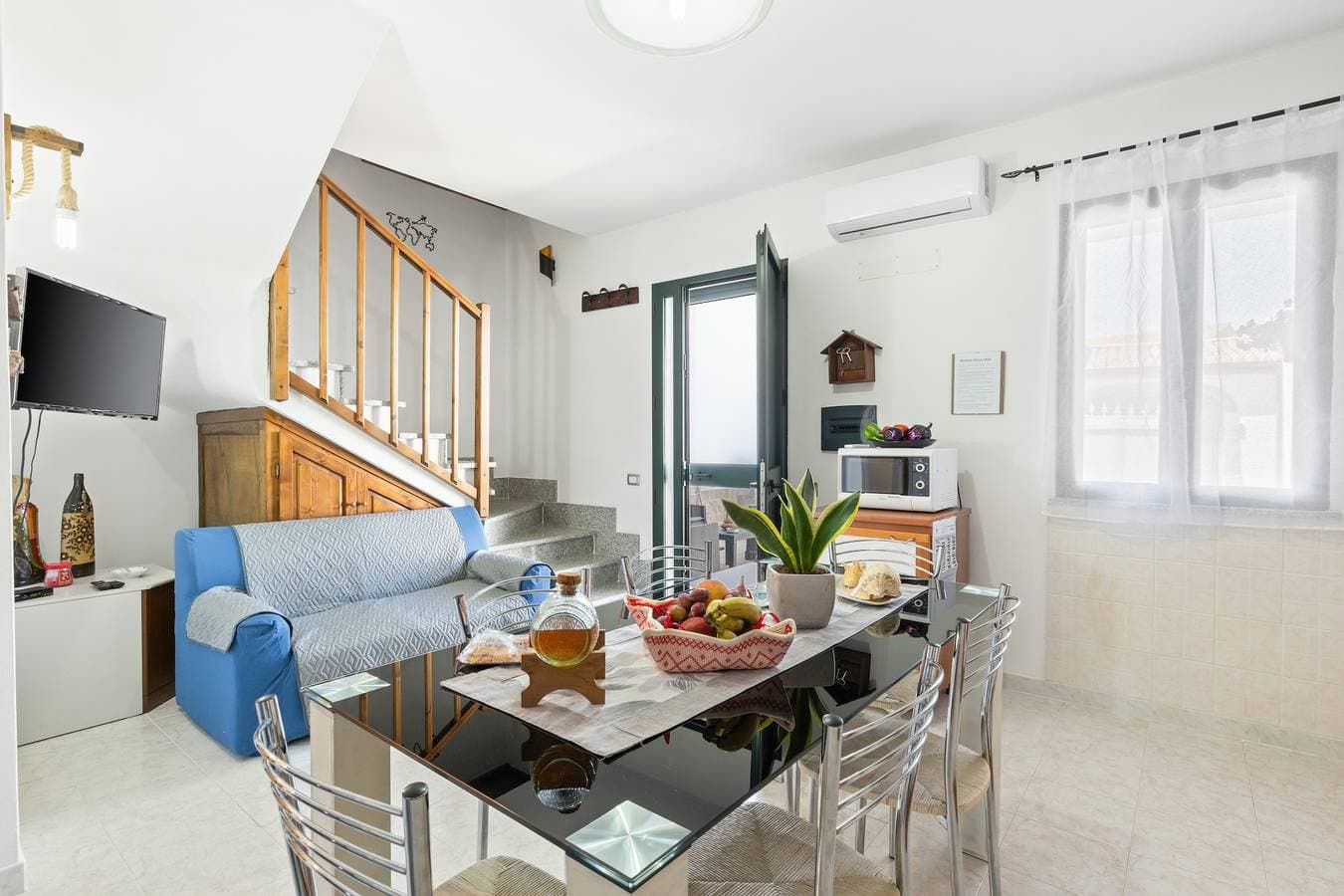 Foto 8 von 31: Ferienhaus 'Marcello' mit Bergblick, Privater Terrasse und Klimaanlage