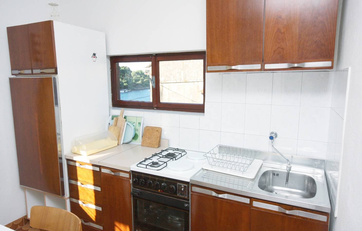 Foto 10 von 17: 2-Zimmer-Ferienwohnung mit Balkon und Meerblick Maslinica, Solta -a