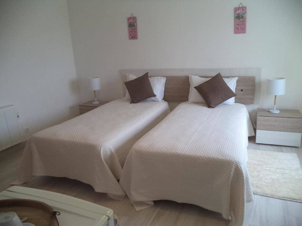 Foto 2 von 17: Twin Room with Private Bathroom