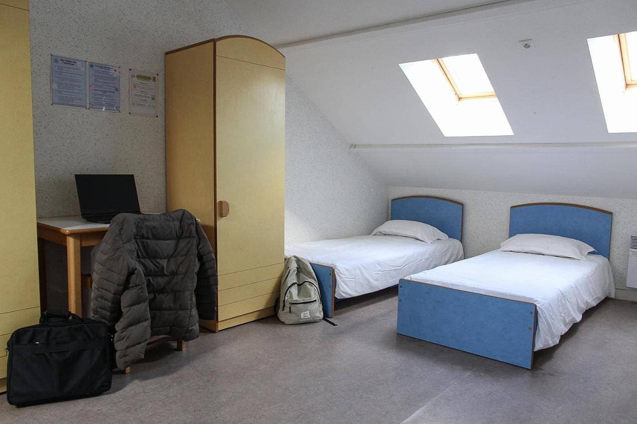 Foto 6 von 6: Twin Room – Shared Bathroom