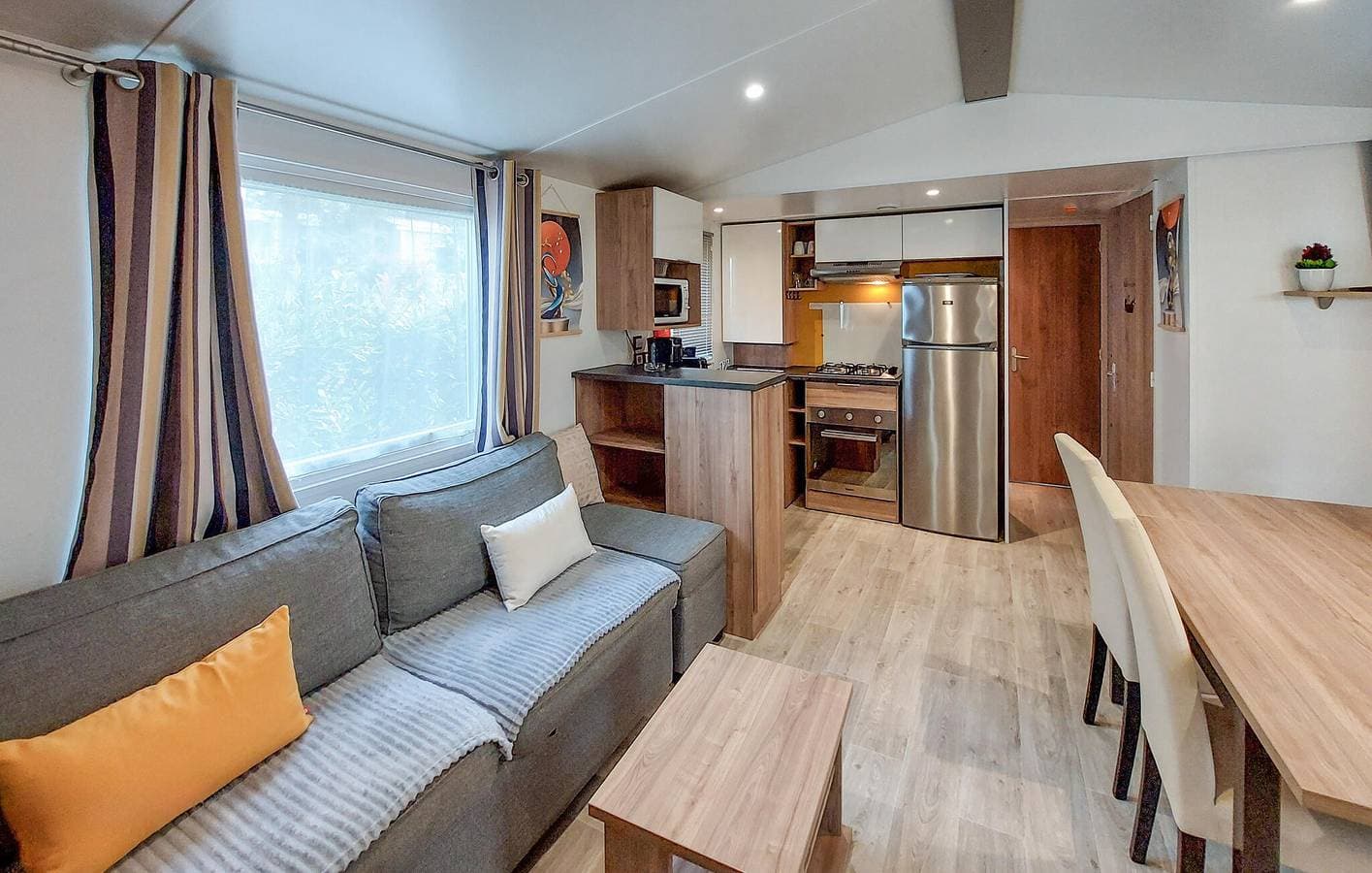 Foto 4 von 30: Gemütliches Mobilheim mit Parkplatz, WiFi, AC, Pool & Garten, Nähe Restaurant