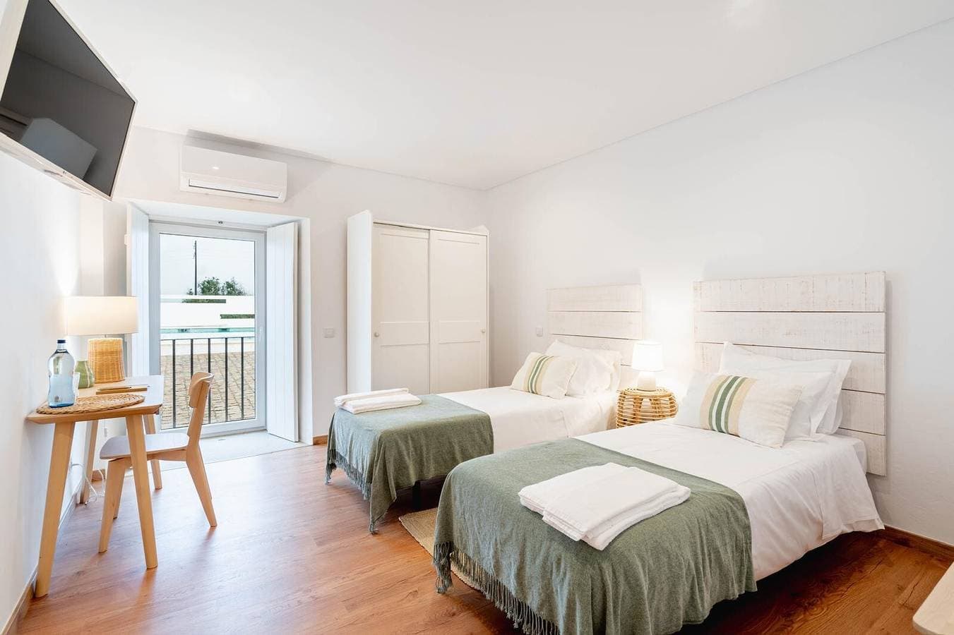 Foto 2 von 15: Zimmer 'Familiar' mit Gemeinschaftspool, WLAN und Klimaanlage