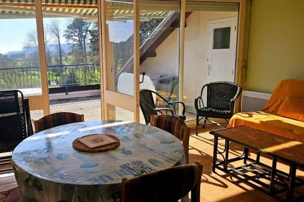 Foto 9 von 28: Apartment with beautiful view over a wooded park and a large terrace