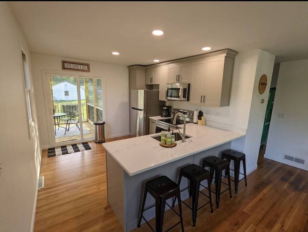 Beautiful home with 150ft sandy beach and private boat launch on Big Sebago!!!!! 1