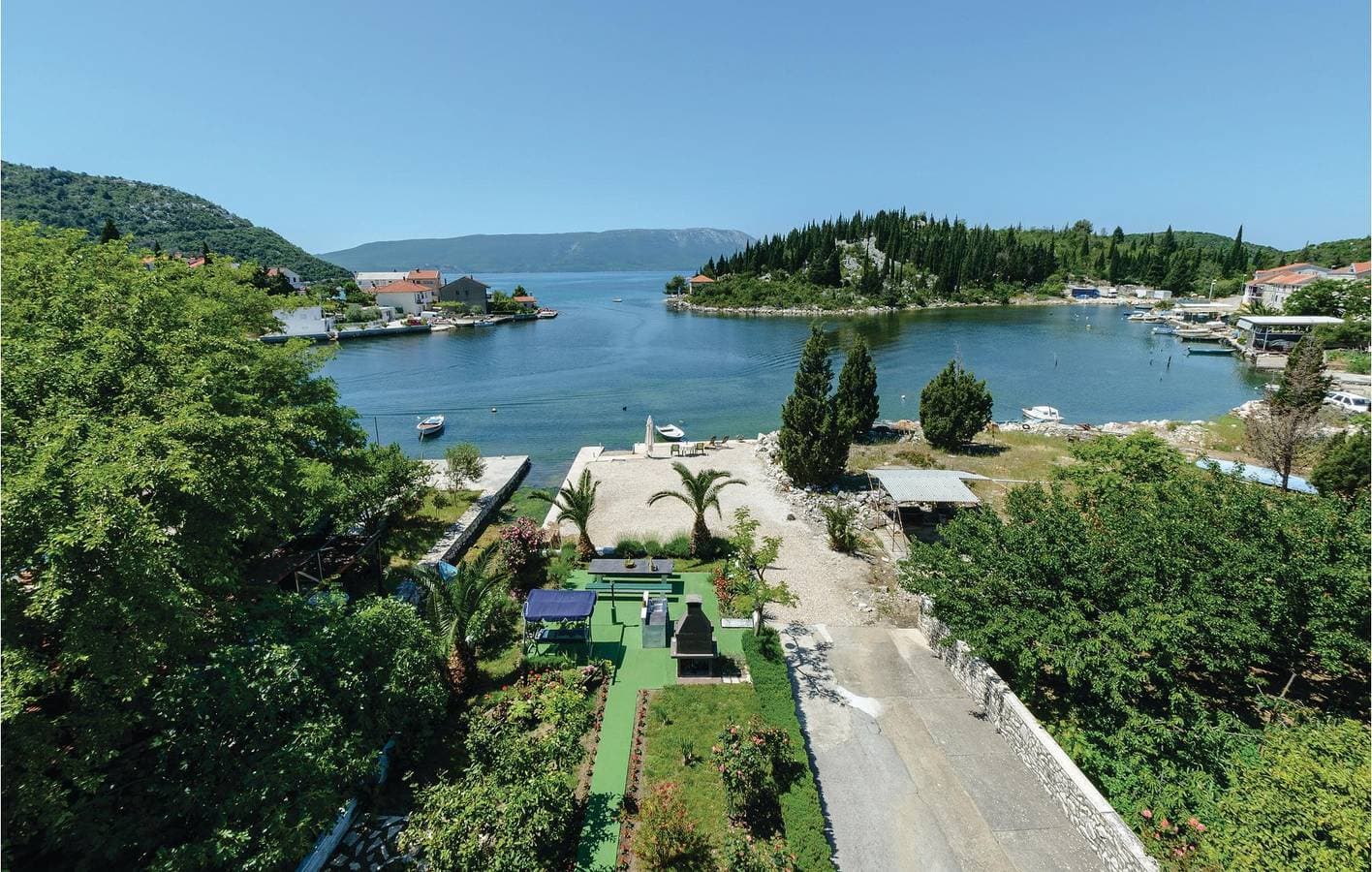 Foto 8 von 32: Gemütliche 300 m zum Strand: Klimatisierte Wohnung mit Terrasse und Parkplatz