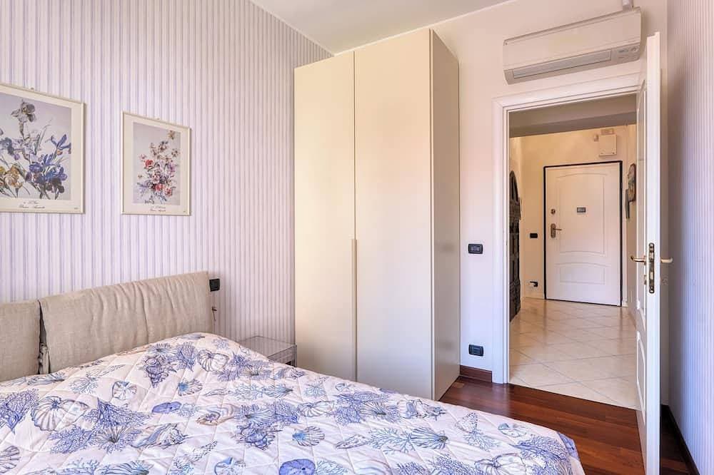 Foto 3 von 26: Palm House apartment in elegant, central setting, a few steps from the sea.