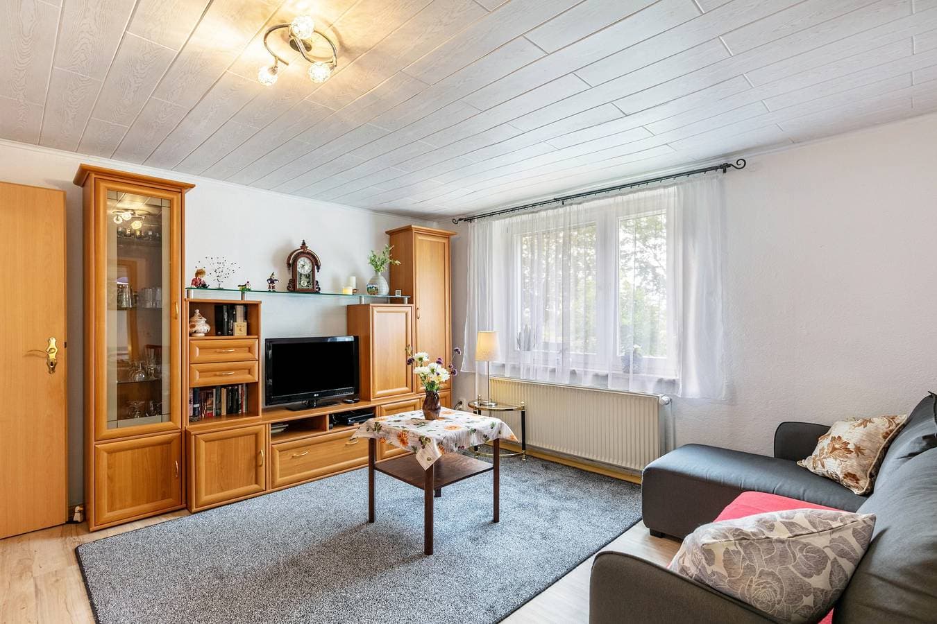 Foto 2 von 27: Ferienwohnung 'Im Blumengarten' mit WLAN, Terrasse & Garten