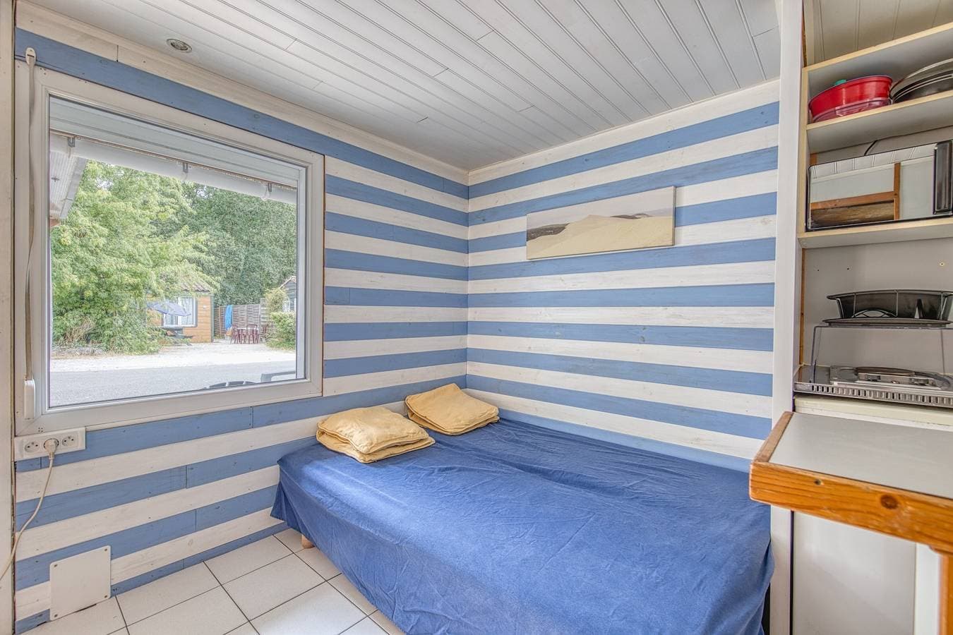 Foto 7 von 33: Ferienwohnung 'Chalet B Village Vacances' mit Gemeinschaftspool, privater Terrasse und WLAN