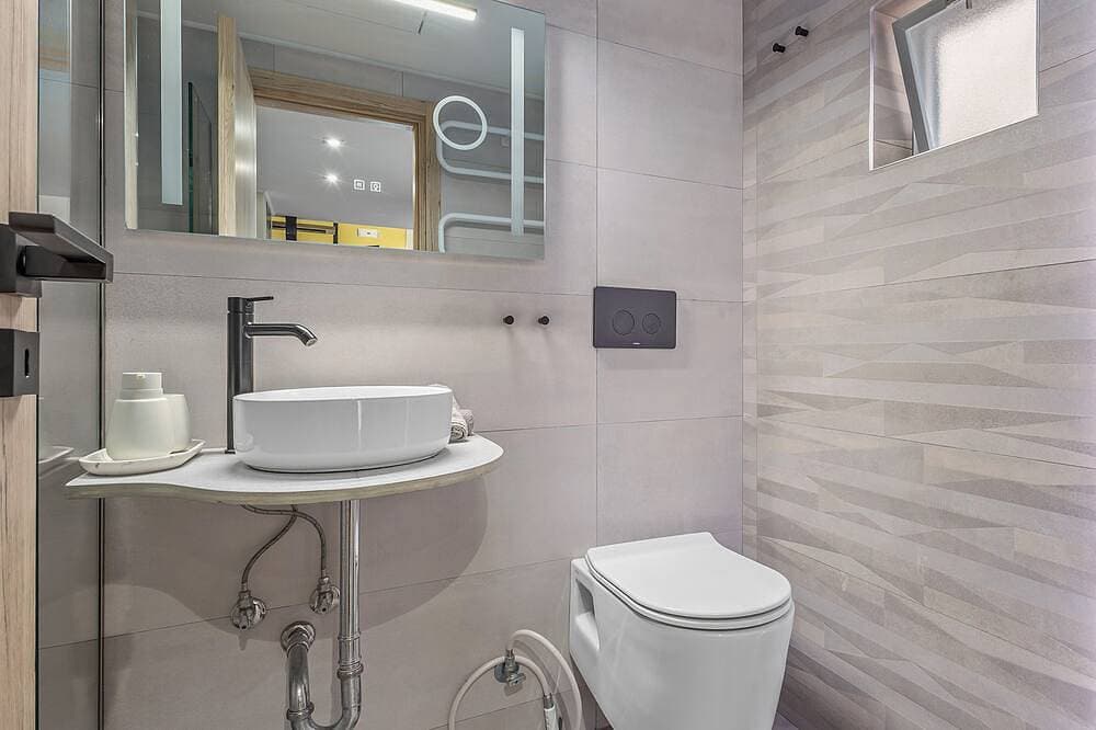 Foto 5 von 23: Charming loft-style apartment just 60 m from Artemida’s long sandy beach!