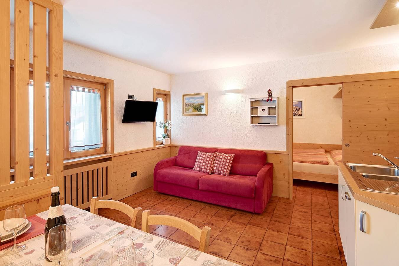 Foto 9 von 21: Ferienwohnung 'Residenz Attila Giardino' mit Bergblick, Gemeinschaftsgarten & WLAN