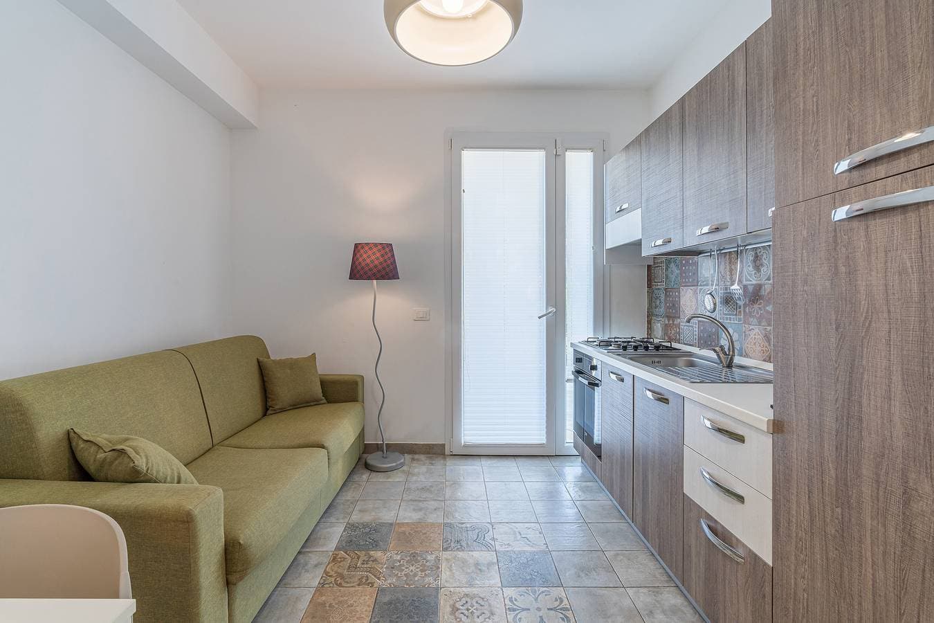 Foto 7 von 30: Apartment 'Cecilia Vista Giardino' mit Gemeinschaftspool, WLAN und Klimaanlage