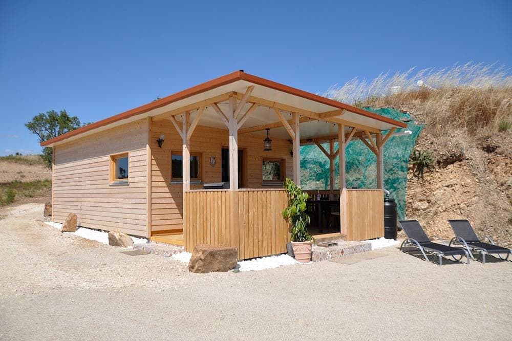 Isoliertes Holzhaus am Stausee/Fluss, Privatstrand, Spielplatz, 25km - Albufeira 1