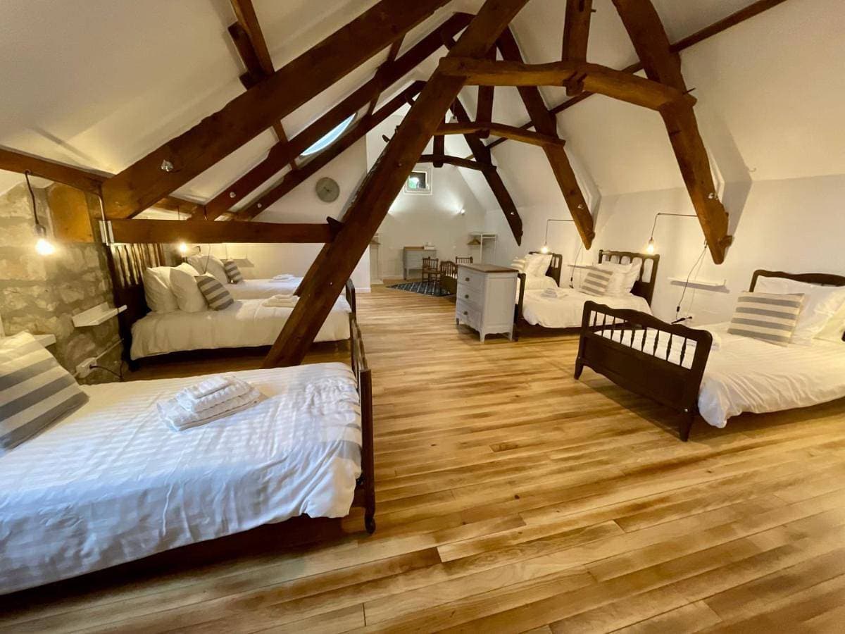 Foto 5 von 22: Quadruple Room with Garden View