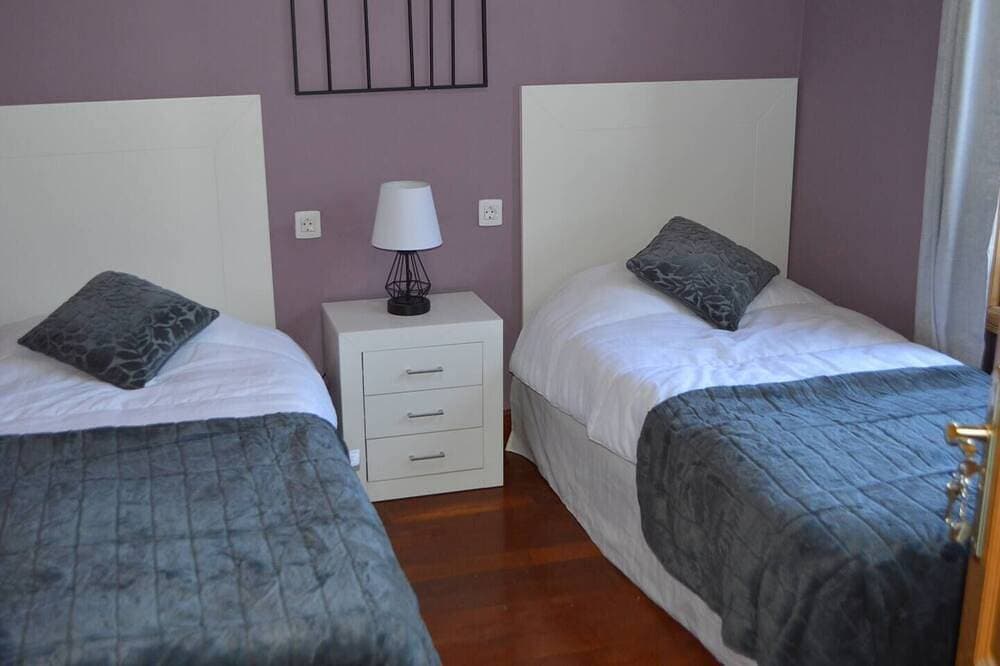This twin room has two single beds with a private separate bathroom ( bathroom across the hallway). ... 1