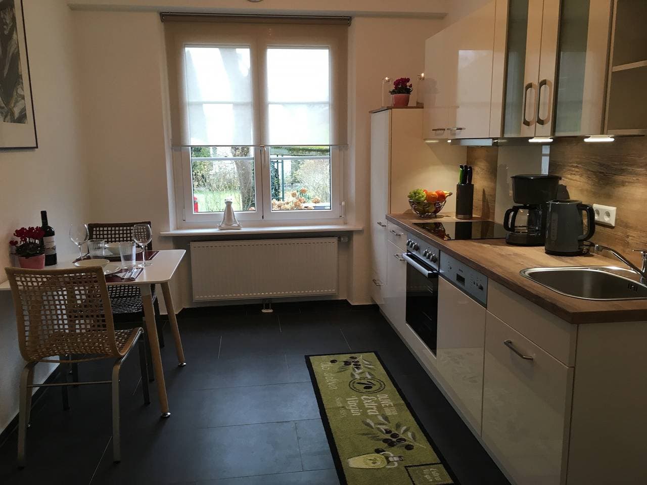 Foto 6 von 12: Ferienwohnung 2 - Unterm Blauregen mit Privatterrasse und Wi-Fi
