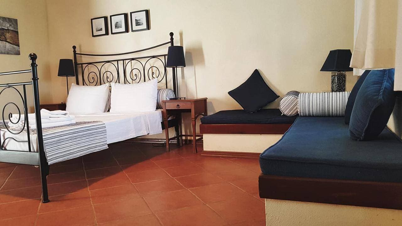 Foto 5 von 12: Triple Room with Terrace