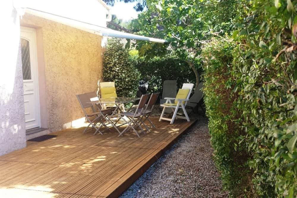 Foto 12 von 12: Unabhängiges Studio Anlage und Garten und eine schattige Terrasse + Parkplatz