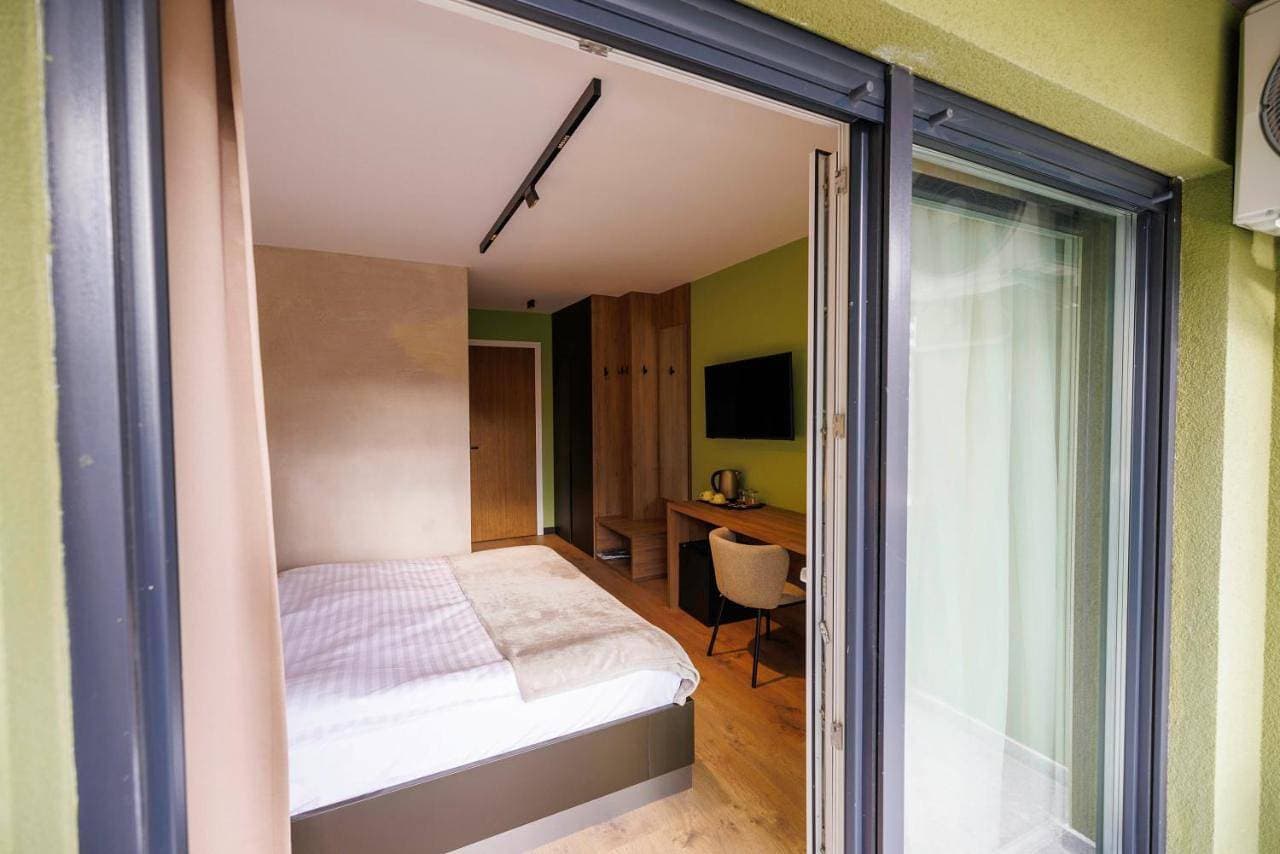 Foto 8 von 11: Double Room with Balcony (2 Adults + 1 Child)