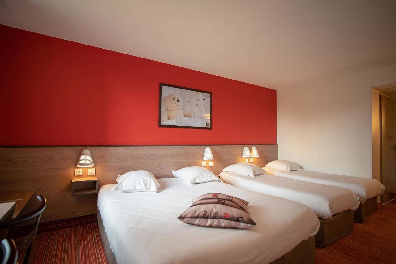 Foto 2 von 9: Triple Room