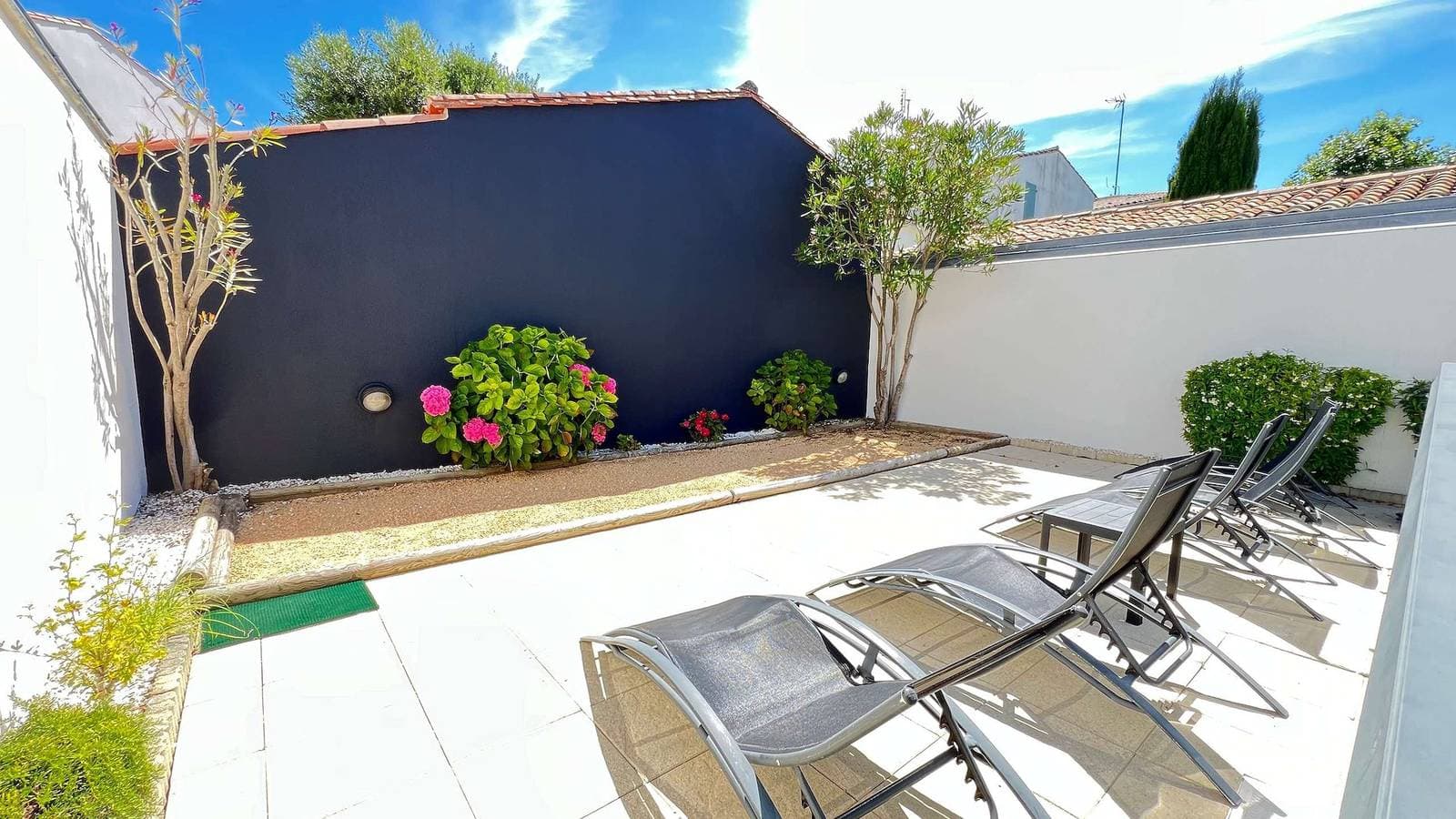 Foto 13 von 13: Ferienwohnung für 6 Personen mit Garten